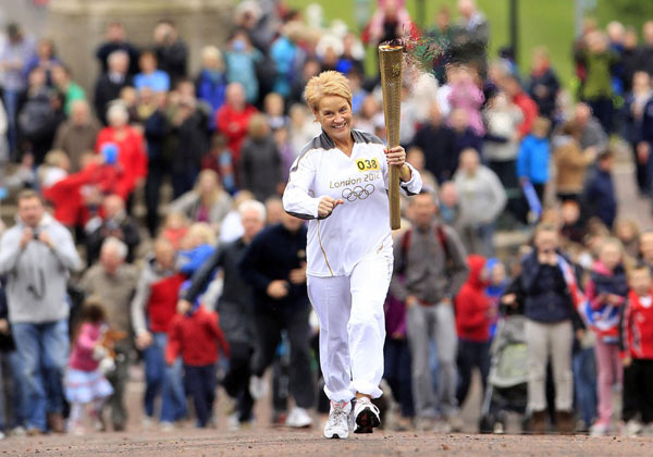 The Olympic torch began its five-day tour of Northern Ireland with plenty of excitement and no signs of trouble Sunday as the territory's Protestants and Catholics vowed to show the world how united the community has become after four decades of conflict. Olympic torch starts 5-day Northern Ireland tour