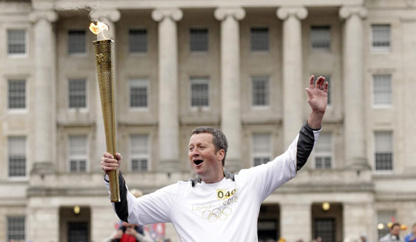 The Olympic torch began its five-day tour of Northern Ireland with plenty of excitement and no signs of trouble Sunday as the territory's Protestants and Catholics vowed to show the world how united the community has become after four decades of conflict. Olympic torch starts 5-day Northern Ireland tour