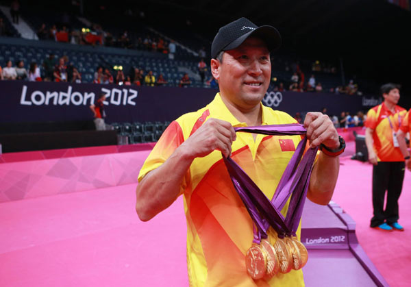 Li Yongbo was more thrilled than anyone after China scored an unprecedented clean sweep of all five golds on offer in London. Badminton coach Li's month just got a whole lot better