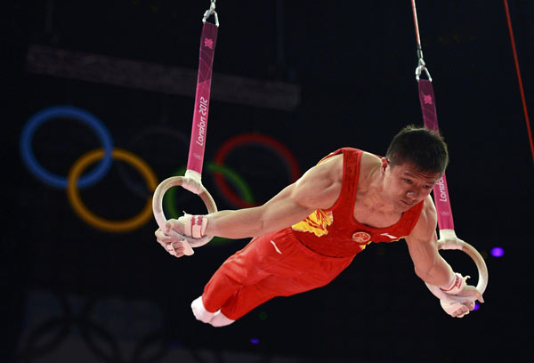 Chen Yibing of China competes in the rings during the men's gymnastics team final in the North Greenwich Arena during the London 2012 Olympic Games July 30, 2012. Olympic preview: China in action on day 10