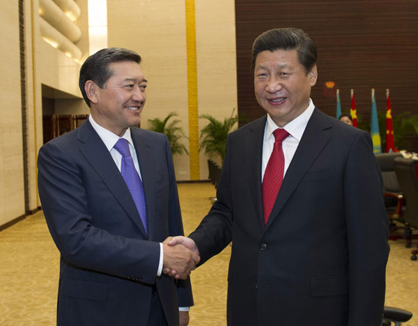 President Xi Jinping (R) meets with Kazakh Prime Minister Serik Akhmetov in Astana, Kazakhastan, Sept 7, 2013. Cooperation with Kazakhstan enjoys broad prospect: Xi