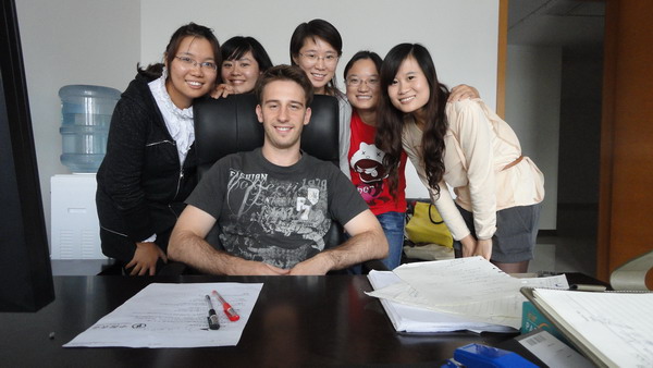 Constantin Holzer (center) with his students at the Suzhou Research Institute of Renmin University of China's International College last year. Low carbon mission helps build bridges