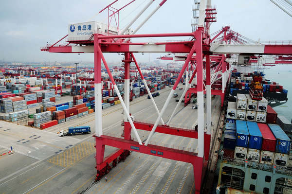 Containers being loaded at Qingdao Port. The share of China's exports in the world's total increased from 4.3 percent in 2001, when China joined the World Trade Organization, to 10.3 percent in 2010. Yu Fangping / For China Daily Slice of export pie may shrink