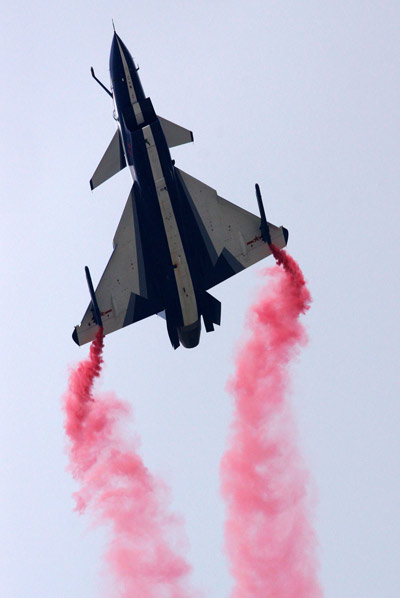 The People's Liberation Army's August 1st Aerobatics Team performs at the MAKS-2013 air show in Zhukovsky on Friday. SHEN JINKE / FOR CHINA DAILY Flight team performs first show abroad