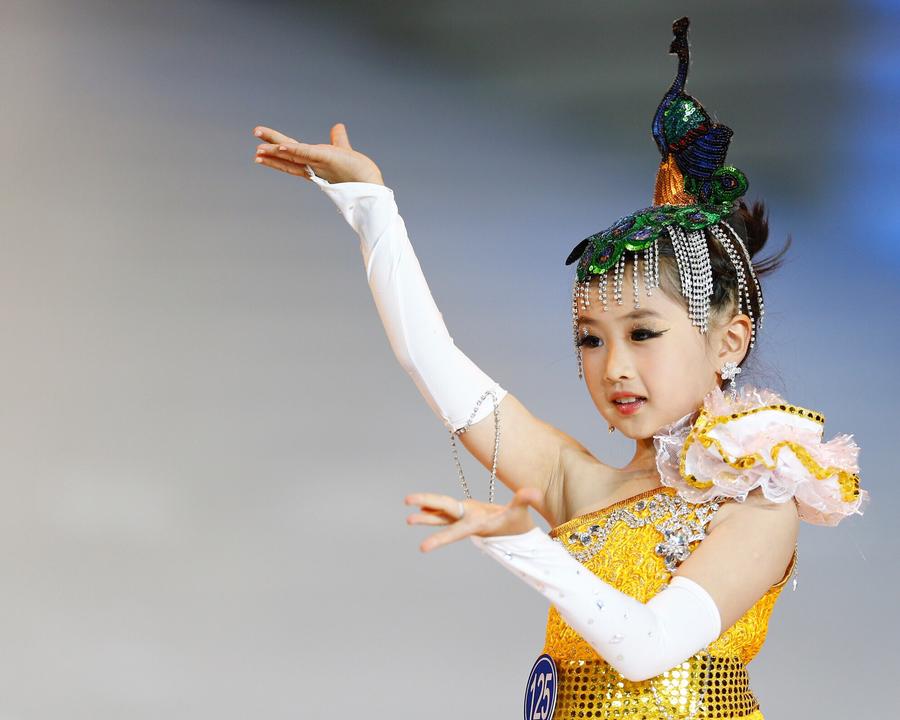 Children take part in 16th China (Qingdao) Int'l Fashion Week