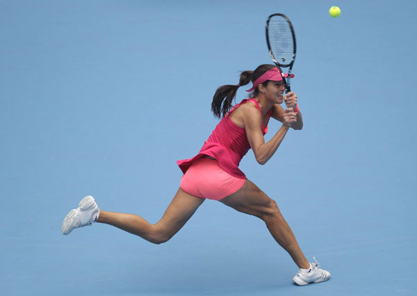 Ana Ivanovic of Serbia returns the ball to Agnieszka Radwanska of Poland during their quarter-final match in the China Open tennis tournament at the National Tennis Center in Beijing October 7, 2011. Ivanovic sends Radwanska to China Open semis