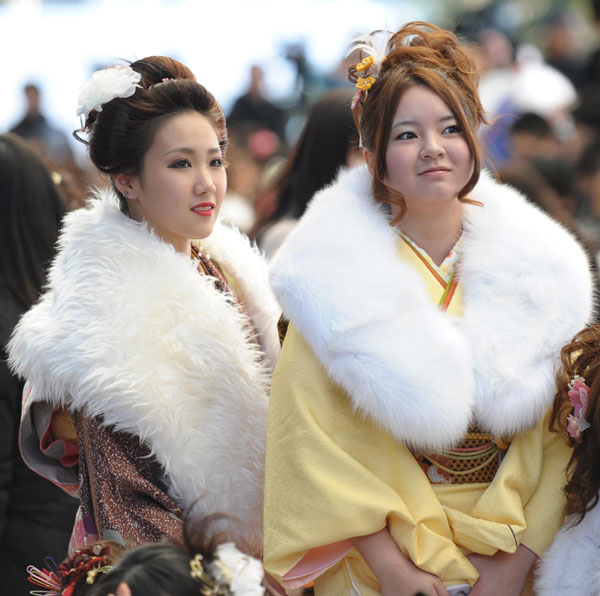Kimono-clad women take part in their Coming of Age Day event in Chiba, Jan 9, 2012. 'Coming of Age Day' with record low number of new adults