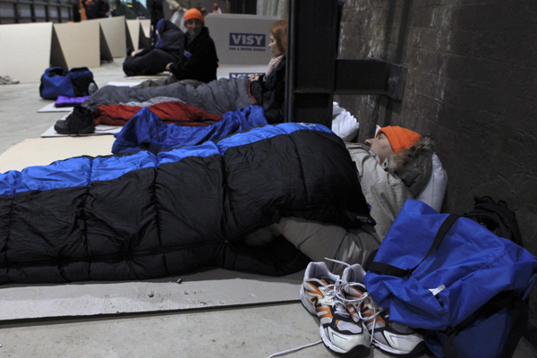 Business chiefs get ready for bedtime in makeshift shelters as they join the homeless for a cold winter night out in the streets in Sydney, Australia, on June 20, 2013. Around 1,200 business leaders took part in CEO Sleepout 2013, run by St Vincent de Paul Society for eight consecutive years, to raise funds for homeless issues. The business leaders exchange their luxurious lifestyles for cardboard bedding on hard ground for a cold winter night in major cities to give themselves a moment to think about the issues and hear stories firsthand. CEOs join the homeless in Australia