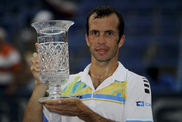 Radek Stepanek of Czech Republic holds up his trophy after defeating Gael Monfils of France in the final match at the Legg Mason Tennis Classic in Washington August 7, 2011. Stepanek upsets Monfils to win Washington title
