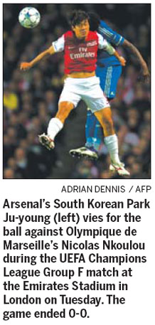 Arsene Wenger defended his decision to rest Robin van Persie after Arsenal's bid to reach the Champions League knockout stage was put on hold following a 0-0 draw with Marseille. Wenger defends van Persie decision