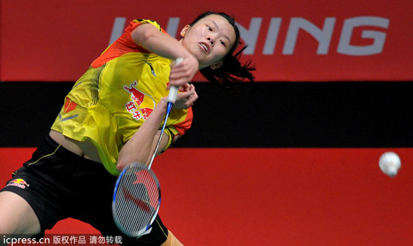 Li Xuerui of China hits a return against Yuswandari Aprilia of Indonesia during their match at the 2013 Sudirman Cup world team badminton championships in Kuala Lumpur, on May 21, 2013. China sweeps Indonesia to reach quarters at Sudirman Cup