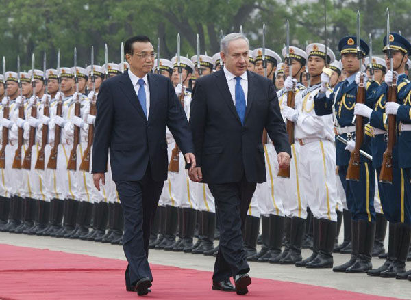 Chinese Premier Li Keqiang (left) holds a welcome ceremony for Israeli Prime Minister Benjamin Netanyahu in Beijing, capital of China, May 8, 2013. China plays greater role in Middle East
